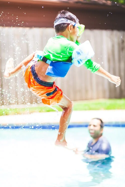 A kid swimming at the miller swmming pool