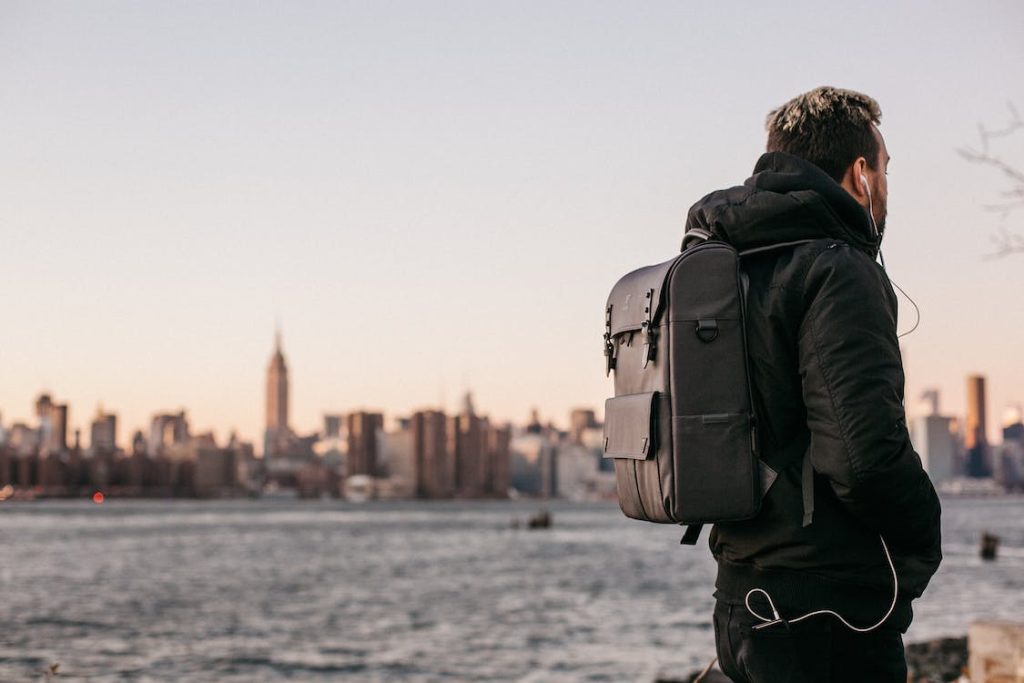 a man with a swim backpack