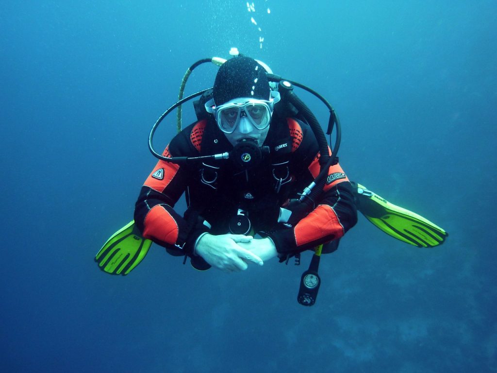 diver making bubble rings with snorkel