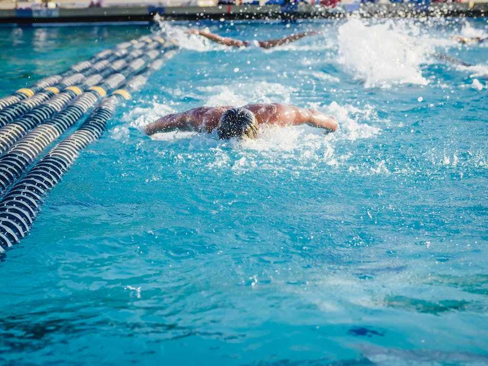 swim athlete display his butterfly stroke technique