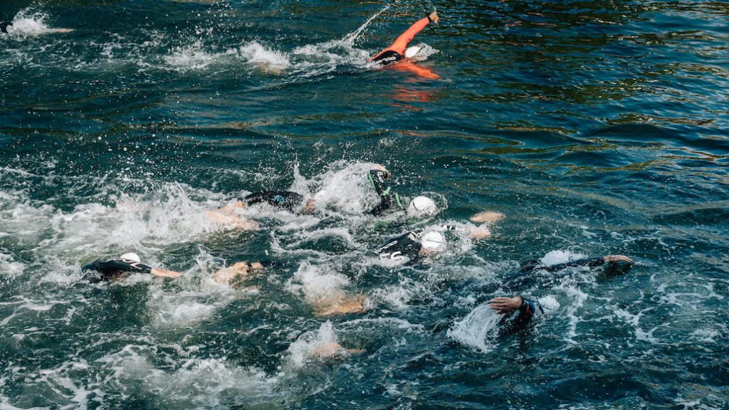 short male swimmers swimming at a meet